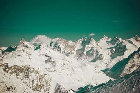 Winter mountains panorama with ski slopes. Caucasus