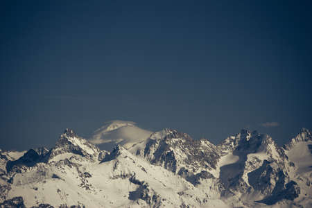 Winter mountains panorama with ski slopes. Caucasus