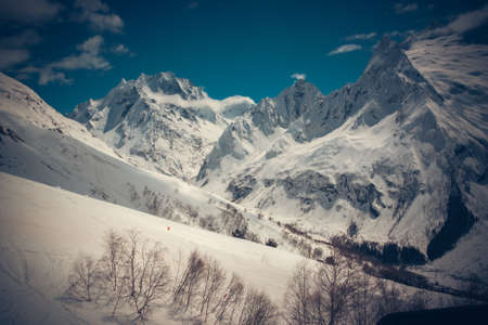 Winter mountains panorama with ski slopes. Caucasusの写真素材