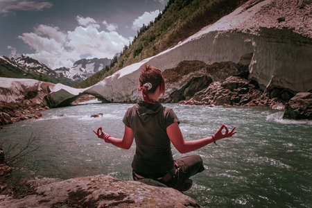 Young woman at summer travel scenic. View Mountains Landscape.の写真素材