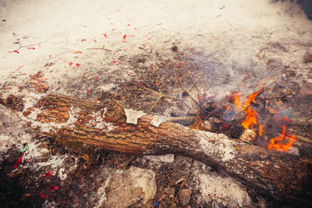 Refuse disposal in a fire in nature, cleaning and waste incineration after the picnicの写真素材