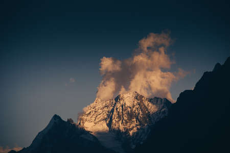 Mountain Valley, Alpine landscape areas. Panoramic view of mountains, trees, glacier.の写真素材