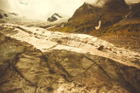 Mountain Valley, Alpine landscape areas. Panoramic view of mountains, trees, glacier.の写真素材