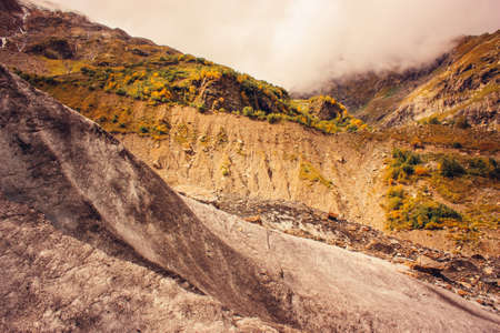 Mountain Valley, Alpine landscape areas. Panoramic view of mountains, trees, glacier.の写真素材