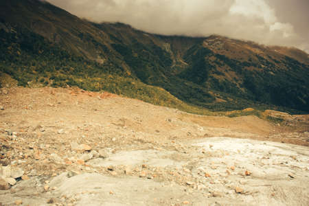 Mountain Valley, Alpine landscape areas. Panoramic view of mountains, trees, glacier.の写真素材