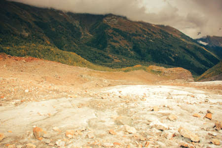 Mountain Valley, Alpine landscape areas. Panoramic view of mountains, trees, glacier.の写真素材