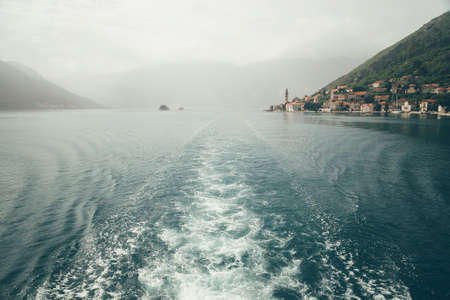 City Perast on coast of Boka Kotor bay, Montenegro, Adriatic Sea, Mediterranean Sea.の写真素材