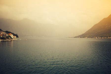 City Perast on coast of Boka Kotor bay, Montenegro, Adriatic Sea, Mediterranean Sea.の写真素材