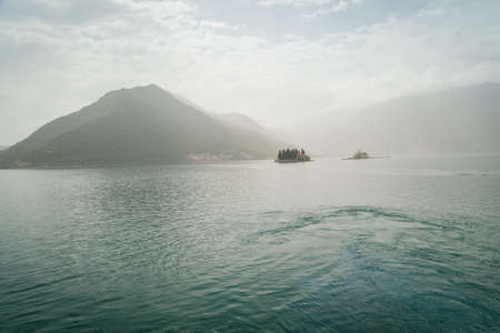 City Perast on coast of Boka Kotor bay, Montenegro, Adriatic Sea, Mediterranean Sea.の写真素材