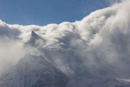 Winter mountains and peaks on a clear day. Caucasus. Landscape winter views in the highlands. The concept of travel and leisure, winter sports, lifestyle, adventure.の写真素材