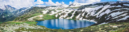 Rocky mountains are a summer landscape, magnificent colorful amazing nature of the escape of high mountains with a turquoise lake. The concept of adventure, hiking, travel lifestyle.の写真素材