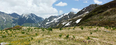Mountains Landscape, tranquil idyllic reserved places, nature idyllic peak scene and alpine meadows. Soncept of travel, hiking and adventure.の写真素材