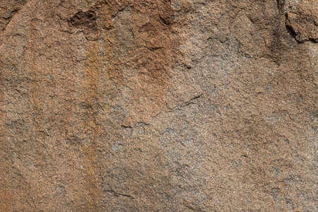 Nature with rough detail of rocks. Grungy abstract natural background, and textured surface material. Stone background tile texture.の写真素材