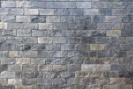 Stone brick wall tile texture. Modern slate outdoor decorative rocks. Masonry mixed block facing...