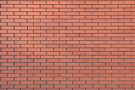 Red brick wall texture grunge background for home and interior design. Wide panoramic view of the...