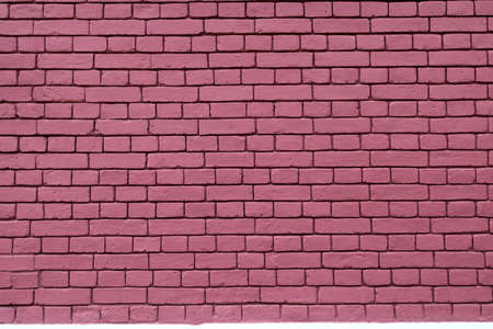 Red brick wall texture grunge background for interior and home design. Wide panoramic photo of the building with good detail. Abstract wallpaper surface brickwork blocks.の写真素材