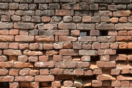 Abstract weathered texture of old grunge aged brick wall background, grungy rusty blocks of masonry...