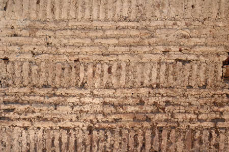 Grunge brick wall old texture background for stone tile block, wallpaper abstract backdrop design. Grungy vintage textured surface.の写真素材