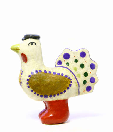toy white chicken in red bootsの写真素材