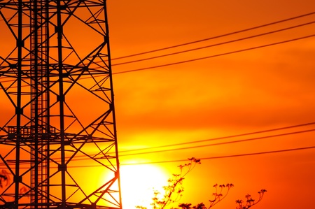 Communications tower with the sun in the evening.の写真素材