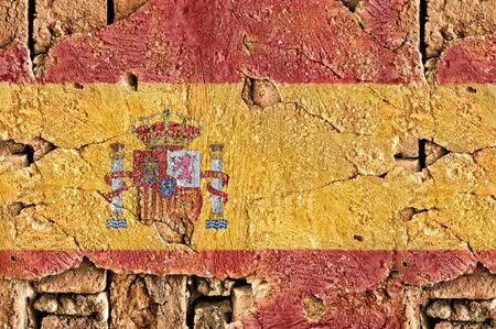 Grunge Spain Flag on a brick wall background の写真素材