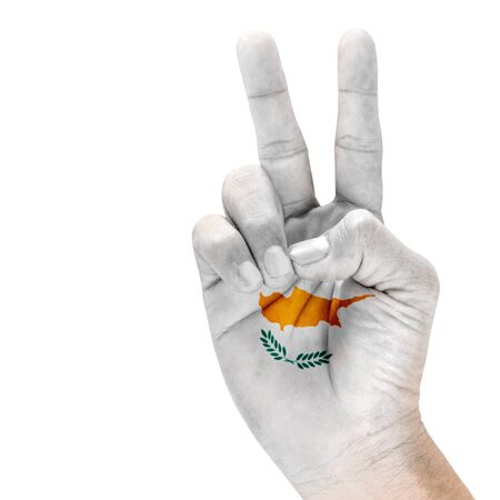 Cyprus flag on victory hand with a white background.の写真素材