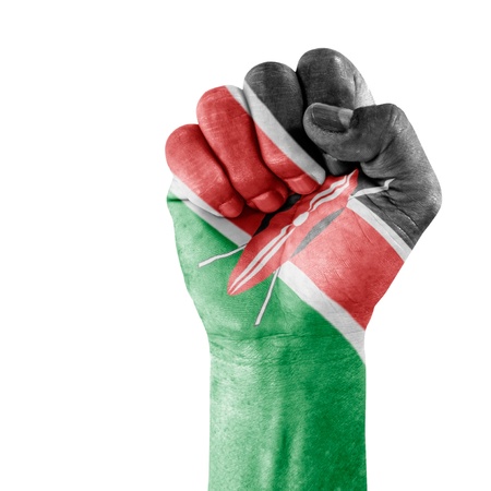 Flag Of Kenya on hand with clenched fist gesture over white background.の写真素材