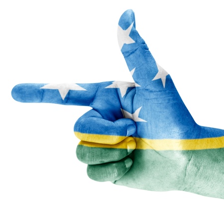 Solomon Islands flag drawn on shoot hand gesture with white background.の写真素材
