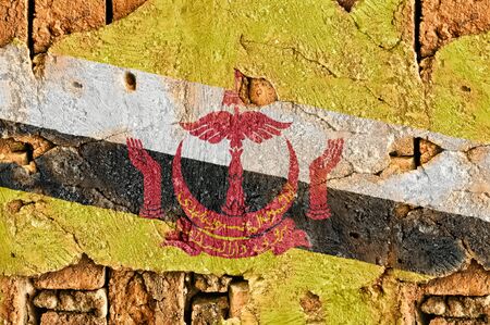 Grunge flag of Brunei on old wall background.の写真素材