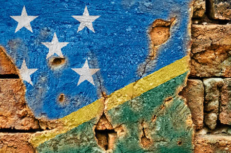 Grunge flag of Solomon Island on old wall background.の写真素材