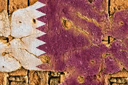 Grunge Flag of Qatar on old wall background.の写真素材