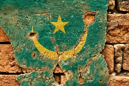 Grunge flag of Mauritania on old wall background.の写真素材