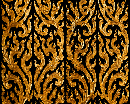 Pattern golden traditional thai style symbol isolated on black. の写真素材