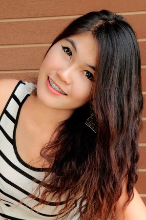 Fashion beautiful young woman is in striped shirts black and white   の写真素材