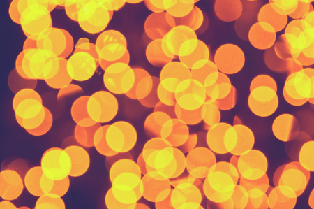 Bokeh lights yellow and orange background.の写真素材