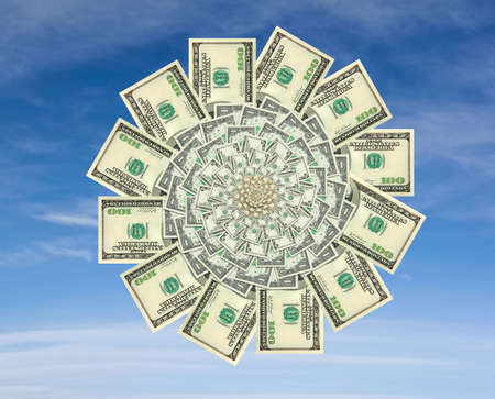 Concept of a money flower on a blue sky background.の写真素材