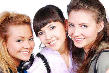 Isolated portrait of three  teenager girlfriends  laughingの写真素材
