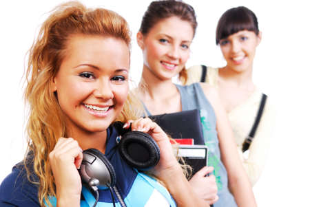 Portrait of a beautiful young funny only female students on a whiteの写真素材