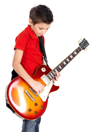 Portrait of young boy with a electric guitar - isolated on white background