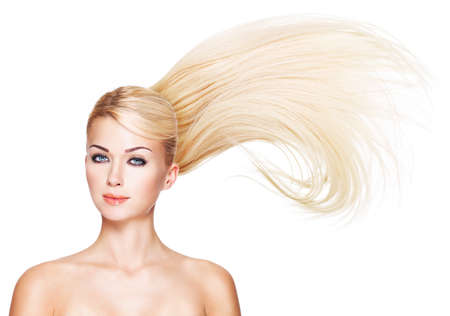 Beautiful woman with long white hair. Closeup portrait of a fashion model over white backgroundの写真素材