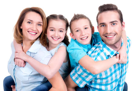 Portrait of the happy european family with children looking at camera -  isolated on white backgroundの写真素材