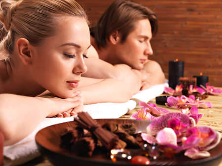 Attractive couple relax at the spa salon. Beauty treatment concept.の写真素材