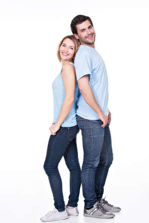 Full portrait of happy couple isolated on white background.の写真素材
