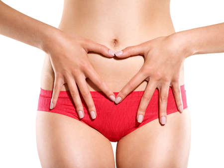 Woman's Fingers Touching her body parts, heart shaped fingersの写真素材