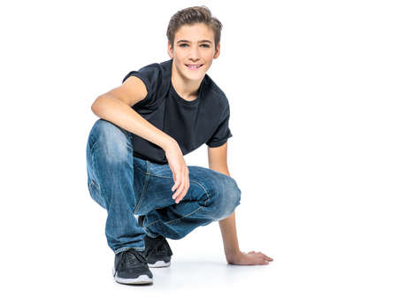 Photo of adorable teenage young happy boy looking at camera.の写真素材