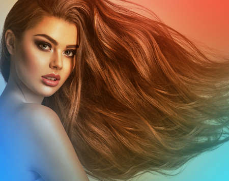 Portrait of a beautiful woman with a long hair. Young  brunette model with  beautiful hair -...