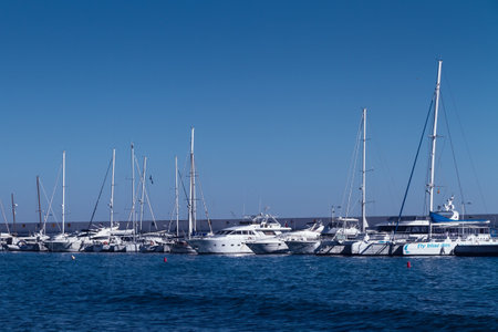MARBELLA, SPAIN - FEBRUARY 11, 2018: White luxury yachts in the harbour of mundane Marbella, Costa...