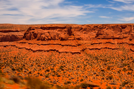The desert landscape, a realm of arid beauty, unfolds as a vast and timeless tapestry of muted colors, undulating dunes, and dramatic vistas. Nature's resilient spirit is on display in this seemingly harsh environment, where the scarcity of water has shaped a unique and captivating terrain.の素材