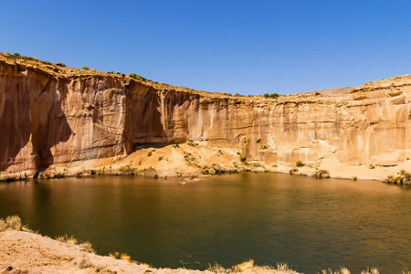 The desert landscape, a realm of arid beauty, unfolds as a vast and timeless tapestry of muted colors, undulating dunes, and dramatic vistas. Nature's resilient spirit is on display in this seemingly harsh environment, where the scarcity of water has shaped a unique and captivating terrain.の素材