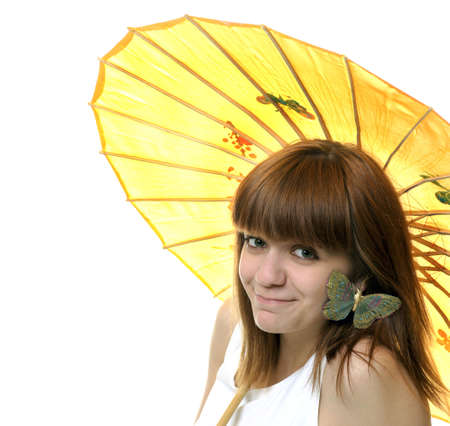 portrait of a happy smiling young good looking  girl  with umbrellaの写真素材